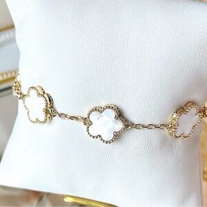 Park Lane Gold Bracelet with White Floral Charms